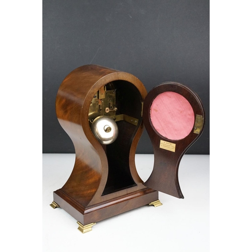 135 - Early 20th century inlaid mahogany balloon form mantel clock, raised on four gilt metal bracket feet... 