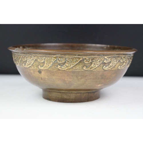 139 - Chinese bronze bowl of circular form, with a band of repeating decoration in relief, approx 24.5cm d... 