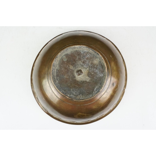 139 - Chinese bronze bowl of circular form, with a band of repeating decoration in relief, approx 24.5cm d... 