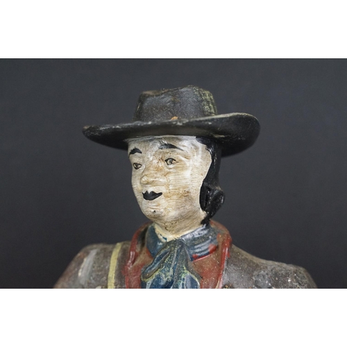 146 - Dutch painted cast metal novelty clock in the form of a clock peddler, approx 38cm high