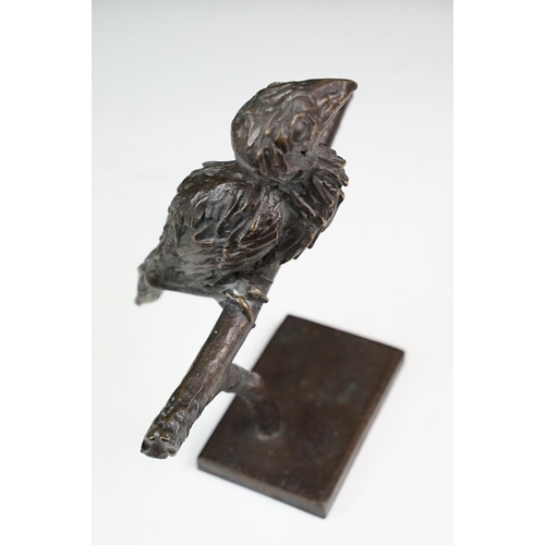 147 - Graham High - A bronze sculpture of a bird perched on a branch, raised on a rectangular base, signed... 