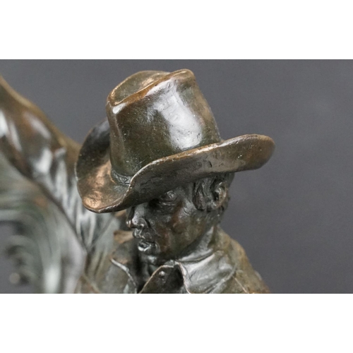 148 - Bronze figure of a rodeo rider on a marble base after Frederic Remington, height approx 48cm