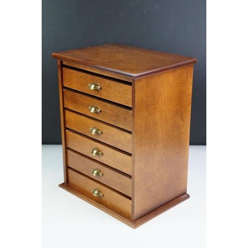 174 - Wooden tabletop collectors cabinet, the six drawers with lined interiors and brass handles, approx 3... 