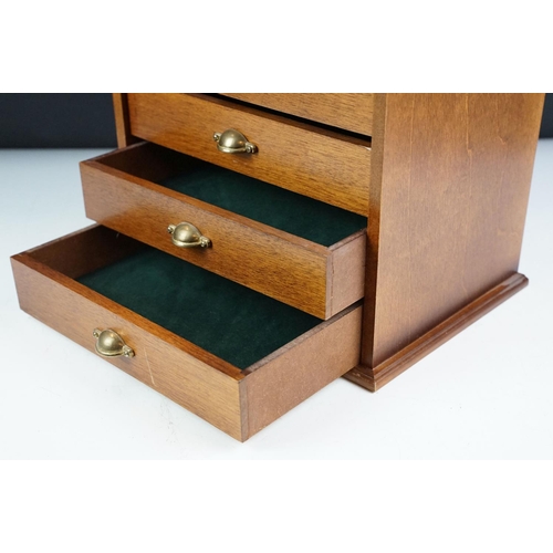 174 - Wooden tabletop collectors cabinet, the six drawers with lined interiors and brass handles, approx 3... 