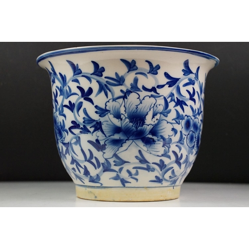 53 - Oriental blue & white ceramic planter with floral decoration, approx 21cm high