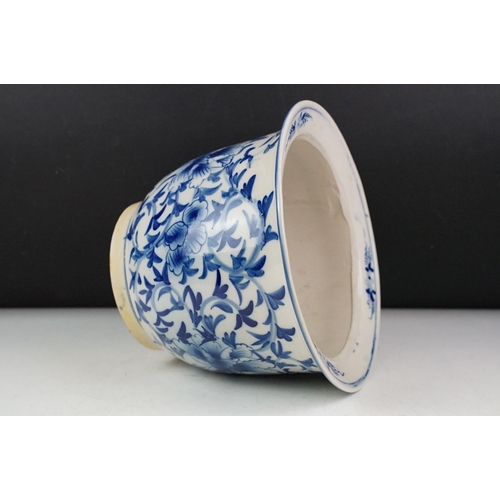 53 - Oriental blue & white ceramic planter with floral decoration, approx 21cm high