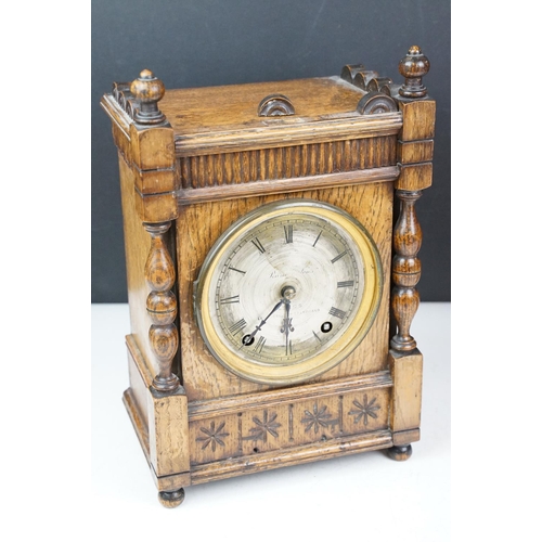 172 - Late 19th / early 20th century carved oak mantel clock with silvered dial, together with an early 20... 