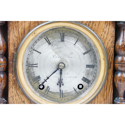 172 - Late 19th / early 20th century carved oak mantel clock with silvered dial, together with an early 20... 