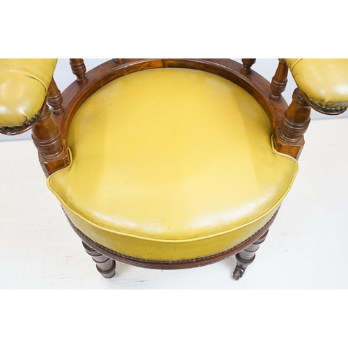 656 - Edwardian mahogany tub shaped armchair, with studded green leatherette button back above galleried b... 