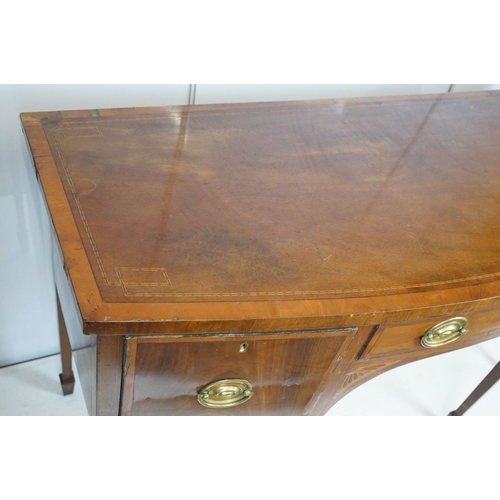 674 - Edwardian mahogany inlaid bowfront sideboard, the central drawer flanked by two cupboard doors, on s... 