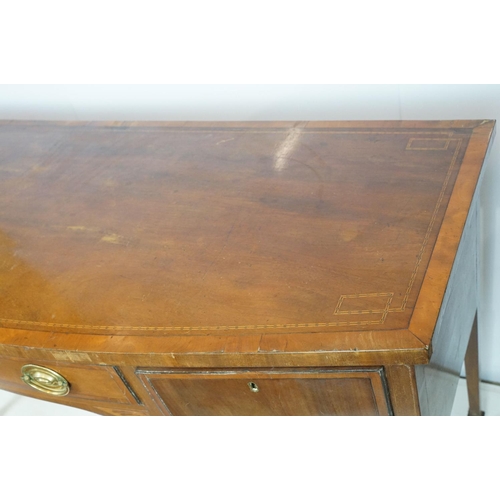 674 - Edwardian mahogany inlaid bowfront sideboard, the central drawer flanked by two cupboard doors, on s... 