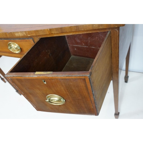 674 - Edwardian mahogany inlaid bowfront sideboard, the central drawer flanked by two cupboard doors, on s... 