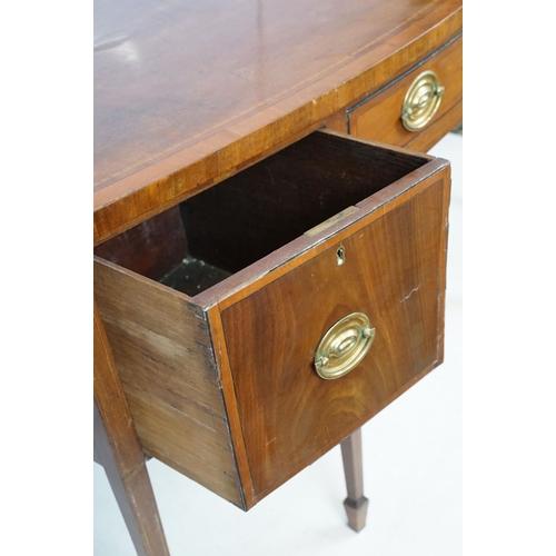 674 - Edwardian mahogany inlaid bowfront sideboard, the central drawer flanked by two cupboard doors, on s... 