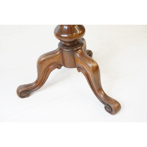 687 - Mahogany piano stool, with three scroll carved legs and velvet top, 50cm high