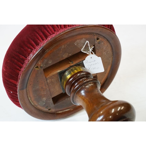 687 - Mahogany piano stool, with three scroll carved legs and velvet top, 50cm high