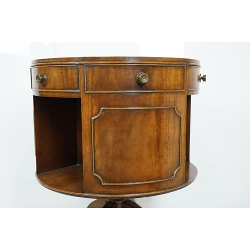 690 - Early 20th century mahogany revolving drum bookcase, with red leather gilt embossed top, with three ... 