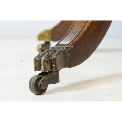 690 - Early 20th century mahogany revolving drum bookcase, with red leather gilt embossed top, with three ... 