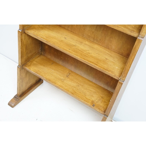 696 - Vintage waxed and polished four tier pine bookcase, 114cm high x 65cm wide x 31cm deep