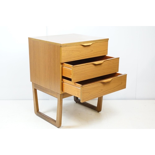 698 - Mid century bedside chest of three drawers, by Europa Furniture, with maker's label, 69.5cm high x 4... 