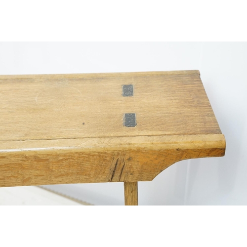 710 - Oak refectory style kitchen bench with stretchered base on tapering legs, 44cm high x 142cm wide x 2... 