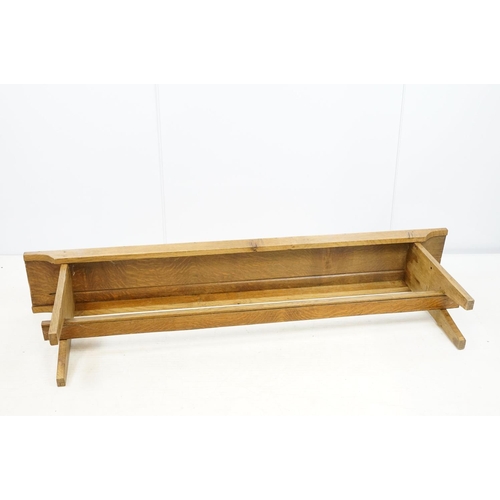 710 - Oak refectory style kitchen bench with stretchered base on tapering legs, 44cm high x 142cm wide x 2... 