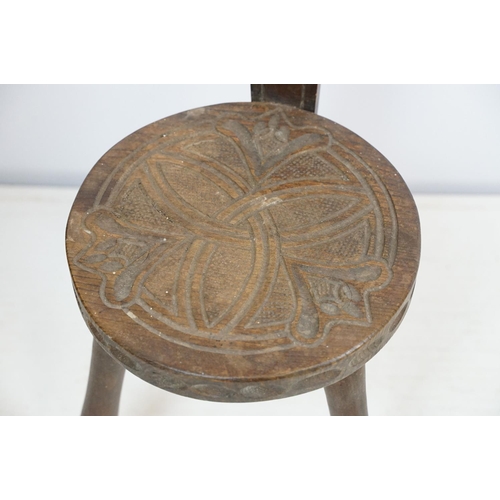 711 - Mid century Ben Setter of Totnes three legged spinning chair with Celtic design, stamped verso, 86cm... 