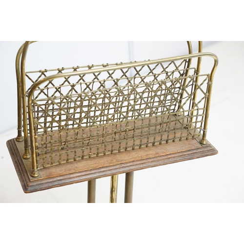 720 - Early 20th century brass and oak magazine rack on brass stand, 78cm high x 36cm wide