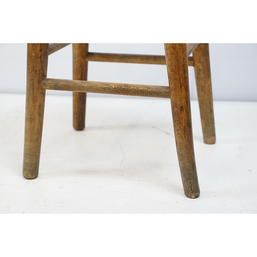 721 - 19th century stool with oval one piece elm seat, 44cm high x 31cm wide