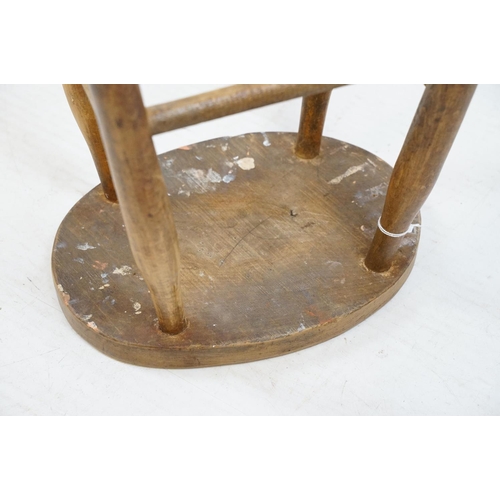 721 - 19th century stool with oval one piece elm seat, 44cm high x 31cm wide