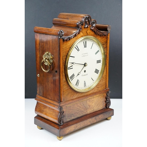 749 - G. T. Hinde, 3 Sekford St., Clerkenwell, mantel timepiece, with ornately carved rosewood case, with ... 