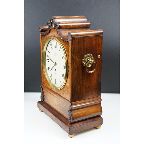 749 - G. T. Hinde, 3 Sekford St., Clerkenwell, mantel timepiece, with ornately carved rosewood case, with ... 