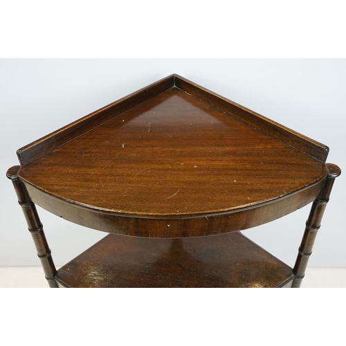 754 - Mahogany two tier table corner table, the legs carved to resemble bamboo, the bottom tier with centr... 