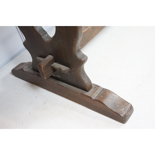 758 - 20th century oak table of lyre end stretchered form, 75cm high x 150.5cm wide x 75.5cm deep