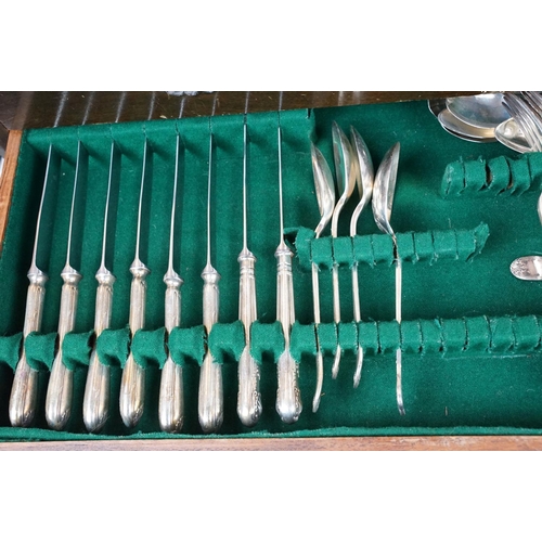 130 - Part canteen of Mappin & Webb silver plated cutlery, housed within a three drawer mahogany cabinet, ... 