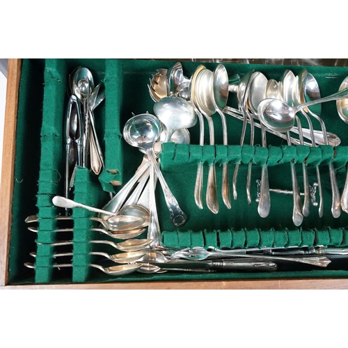 130 - Part canteen of Mappin & Webb silver plated cutlery, housed within a three drawer mahogany cabinet, ... 