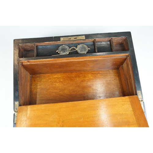 163 - Victorian brass bound walnut writing slope with vacant brass inlay to lid, opening to an interior wi... 