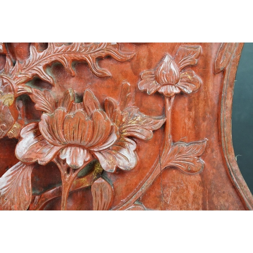 165 - Chinese red lacquered carved wooden sculpture depicting a grotesque mask, bird & flower, approx 43cm... 