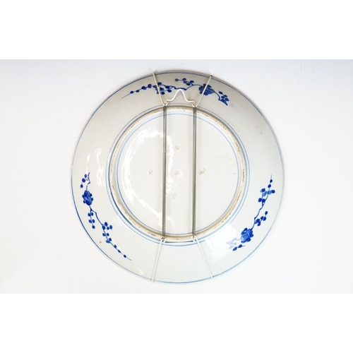 62 - Chinese blue & white charger decorated with a scene with boat and mountains beyond, approx 40cm diam... 