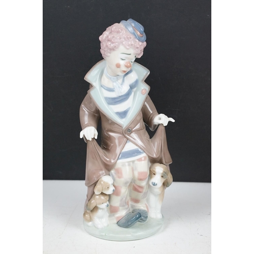 80 - Collection of porcelain figures to include Lladro & Nao examples, featuring Lladro Jester Sad Clown ... 