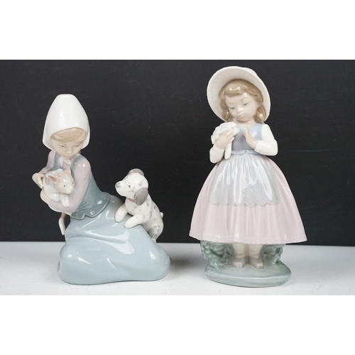 80 - Collection of porcelain figures to include Lladro & Nao examples, featuring Lladro Jester Sad Clown ... 