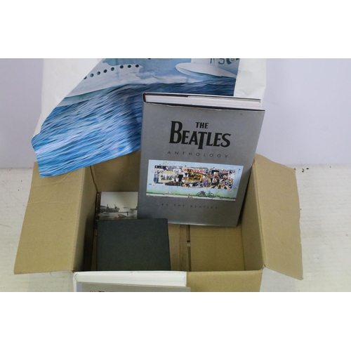 491 - The Beatles Anthology, The Beatles - Unseen Archives, and a Beatles mug, together with a group of Su... 