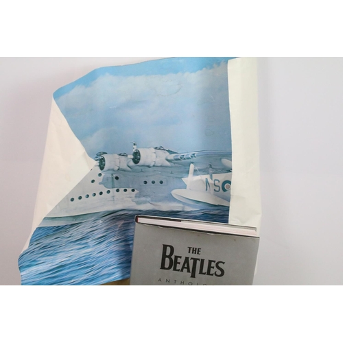 491 - The Beatles Anthology, The Beatles - Unseen Archives, and a Beatles mug, together with a group of Su... 