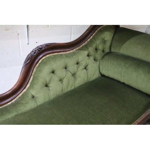 643 - Victorian mahogany framed chaise longue of scrolled form with green upholstery, approx 175cm wide x ... 