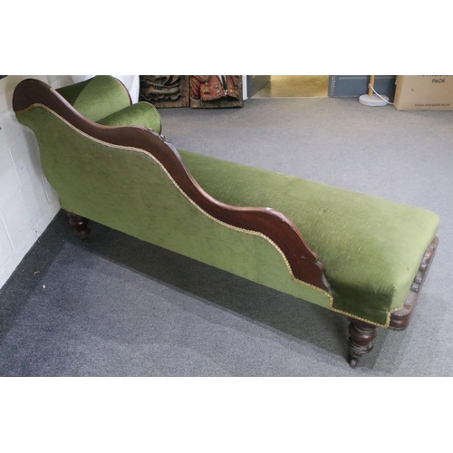 643 - Victorian mahogany framed chaise longue of scrolled form with green upholstery, approx 175cm wide x ... 