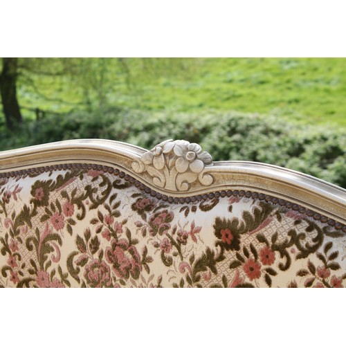 664 - French carved wooden bed frame, the top rail carved with floral design, headboard approximately 146c... 