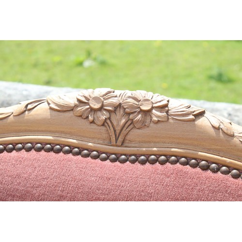 664 - French carved wooden bed frame, the top rail carved with floral design, headboard approximately 146c... 