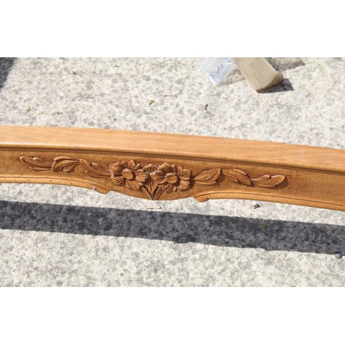 664 - French carved wooden bed frame, the top rail carved with floral design, headboard approximately 146c... 