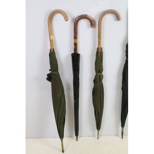 127 - Group of eight vintage umbrellas & walking sticks to include early-to-mid 20th century examples, fea... 