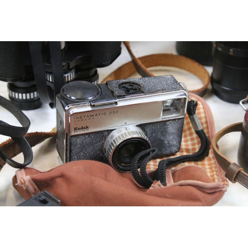 459 - Collection of cameras, lenses & binoculars within a leather case, the lot featuring Olympus FTL (wit... 