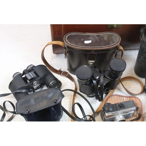 459 - Collection of cameras, lenses & binoculars within a leather case, the lot featuring Olympus FTL (wit... 